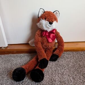 Cuddly Fox Plush Toy with Red Bow